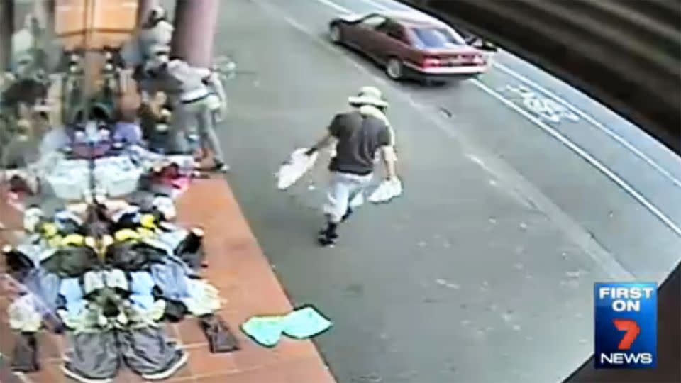 This man appears to be discarding an item of clothing he doesn't want on the floor a few metres away. Photo: 7 News