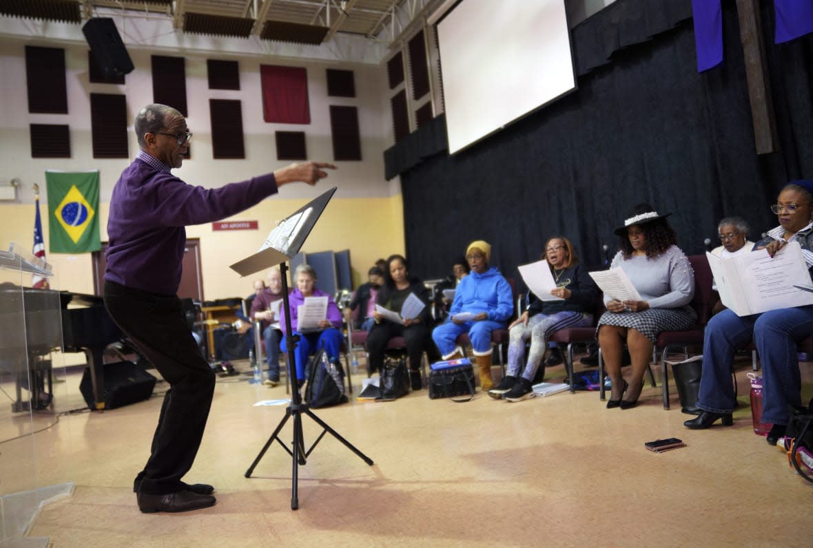 Herbert V.R.P. Jones, the founder and director of The Heritage Gospel Chorale of Pittsburgh leads rehearsal at Bethany Baptist Church for an upcoming concert honoring the late gospel composer, musician and publisher, Charles Henry Pace, on Monday, March 6, 2023, in Pittsburgh. (AP Photo/Jessie Wardarski)