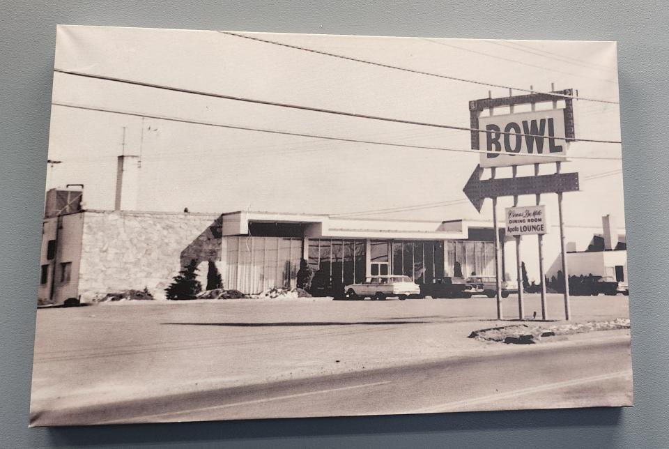 The photo that shows the Venus de Milo back when it was a bowling alley still hangs in the office at the banquet hall on Route 6.