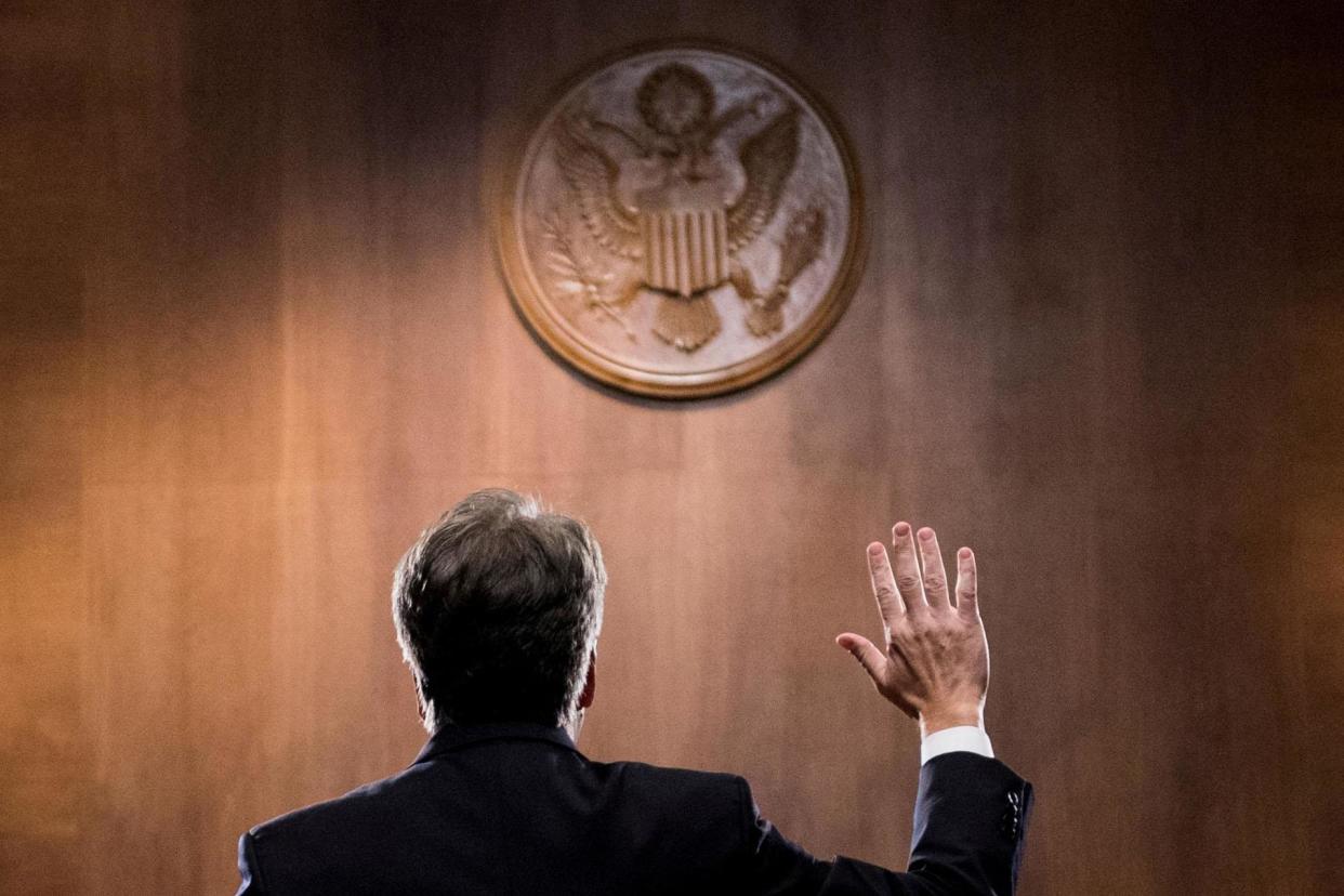 The judge is sworn in before testifying before the US Senate Judiciary Committee in Capitol Hill: Reuters