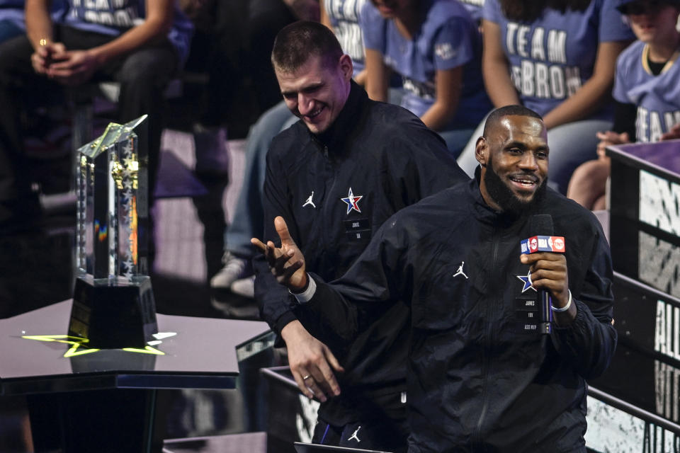 Nikola Jokic of the Denver Nuggets jokes with captain LeBron James of the Los Angeles Lakers after being selected during NBA All-Star Game Draft at Vivint Arena in Salt Lake City on Feb. 19, 2023. (AAron Ontiveroz/MediaNews Group/The Denver Post via Getty Images)