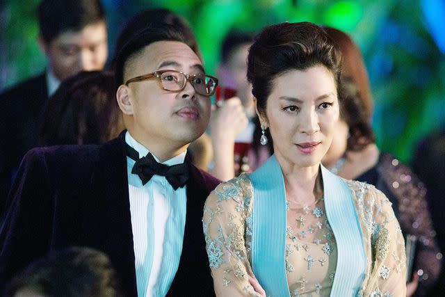Warner Bros. Pictures Nico Santos and Michelle Yeoh in 'Crazy Rich Asians'