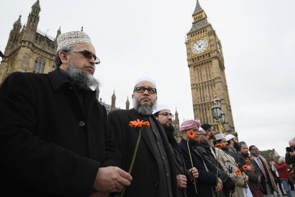 Moving: Imams gathered on Westminster Bridge for the vigil (Getty Images)