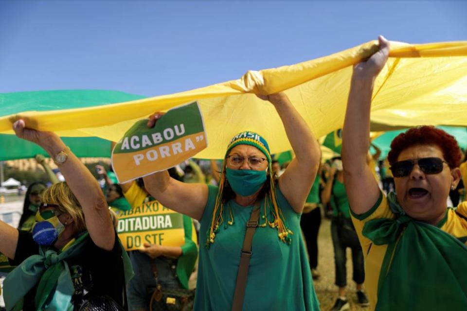 Demonstrators support Jair Bolsonaro in May 2020. The Brazilian president has touted unproven Covid treatments including ivermectin.