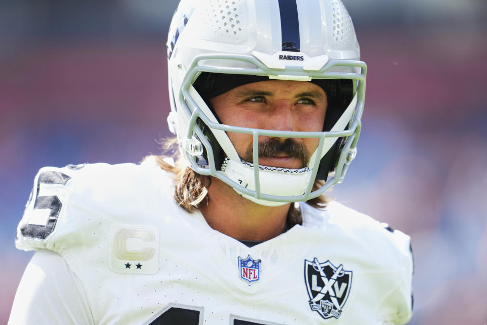 DENVER, CO - OCTOBER 06: Gardner Minshew #15 of the Las Vegas Raiders warms up before kickoff against the Denver Broncos during an NFL football game at Empower Field at Mile High on October 6, 2024 in Denver, Colorado. (Photo by Cooper Neill/Getty Images)