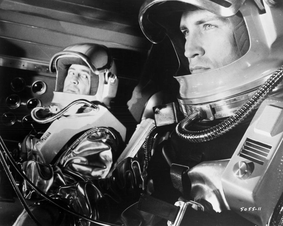 Ian Hendry and Roy Thinnes sit in the cockpit of their ship in a scene from the film 'Journey To The Far Side Of The Sun', 1969. (Photo by Universal/Getty Images)