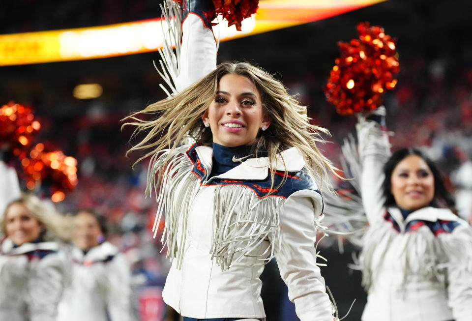 Nov 26, 2023; Denver, Colorado, USA; Denver Broncos cheerleaders perform in the second half against the <a class="link " href="https://sports.yahoo.com/nfl/teams/cleveland/" data-i13n="sec:content-canvas;subsec:anchor_text;elm:context_link" data-ylk="slk:Cleveland Browns;sec:content-canvas;subsec:anchor_text;elm:context_link;itc:0">Cleveland Browns</a> at Empower Field at Mile High. Mandatory Credit: Ron Chenoy-USA TODAY Sports