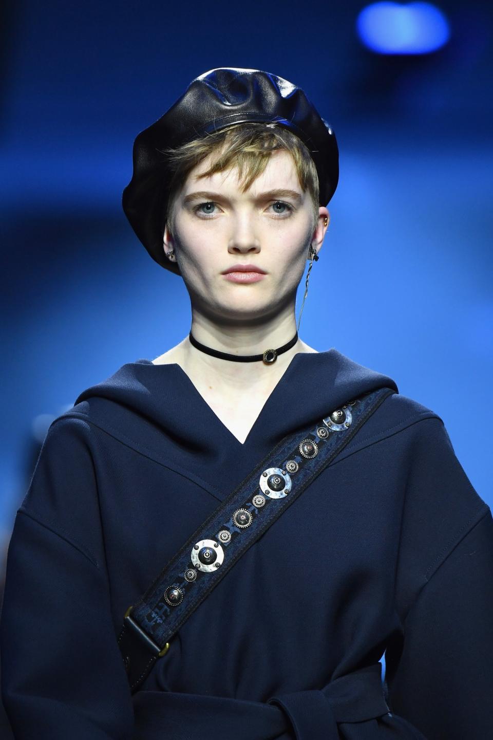 Model Ruth Bell sports the new black leather beret at the Christian Dior Fall/Winter 2017 show.