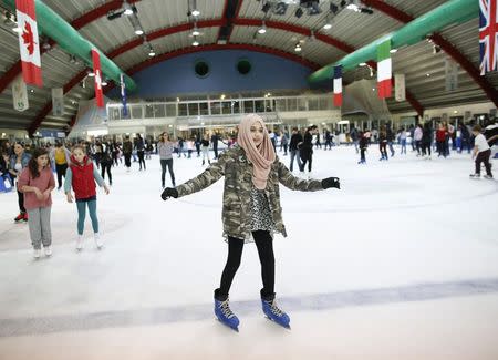 Ameera, 12, ice skates in east London March 8, 2014. REUTERS/Olivia Harris