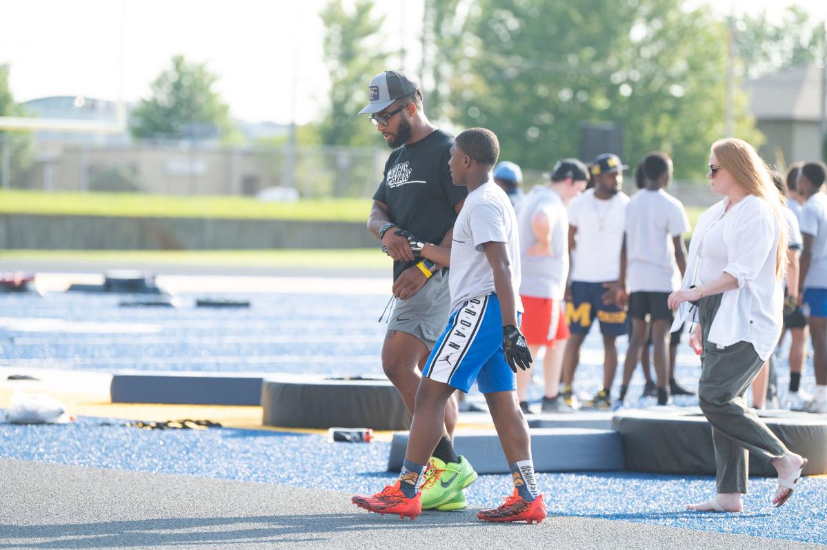 NFL player Chris Evans brings his training camp to Battle Creek with the message of giving back