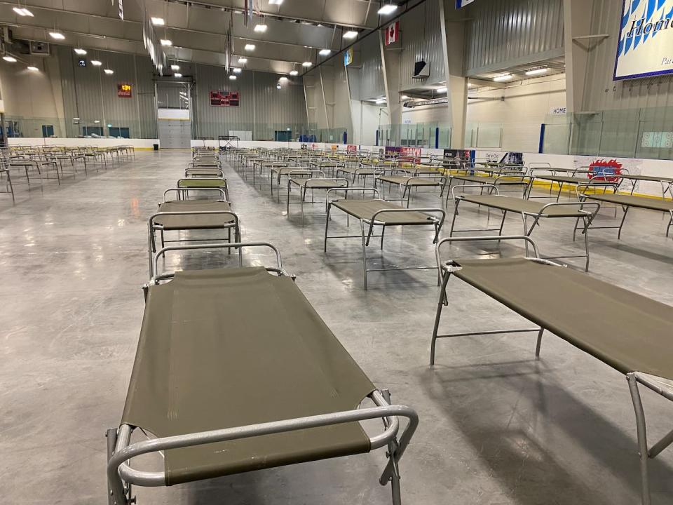 Cots were set up at the Yellowknife Multiplex as of 1:30 p.m. on Wednesday. The facility will be used as an evacuation centre if the city issues an order for residents to leave their homes. 