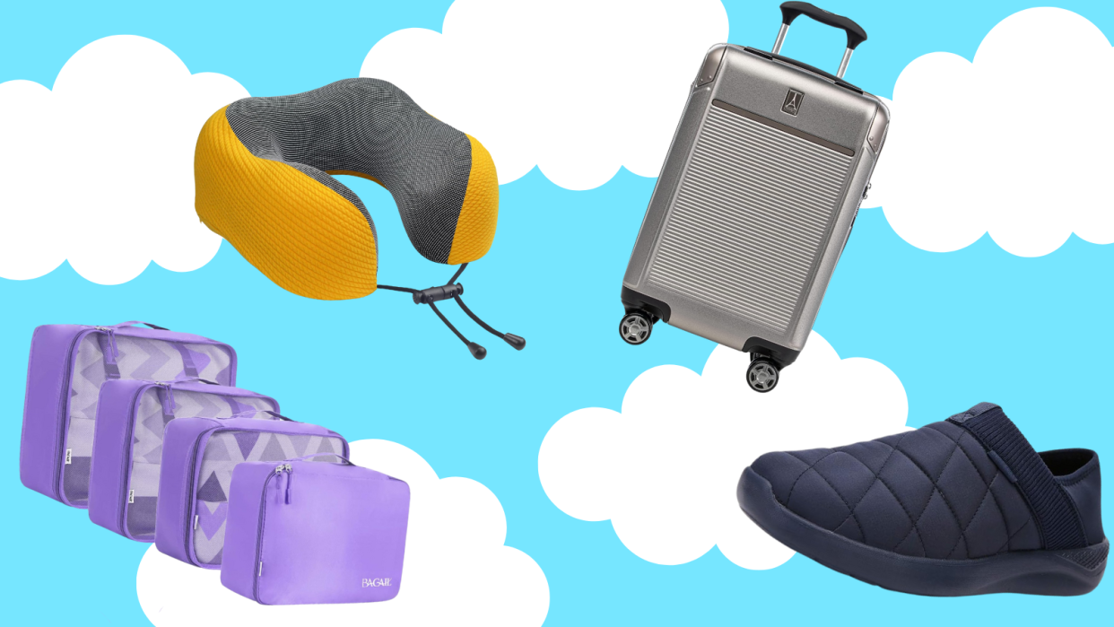 travel essentials: a yellow and gray neck pillow, purple packing cubes, a silver rolling suitcase and a navy blue slipper floating on a blue sky with clouds