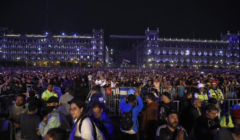 Fans of Argentine band Los Fabulosos Cadillacs enjoy their performance during a free live concert at the Zocalo (main square) in Mexico City on June 3, 2023. (Photo by CLAUDIO CRUZ / AFP) (Photo by CLAUDIO CRUZ/AFP via Getty Images)