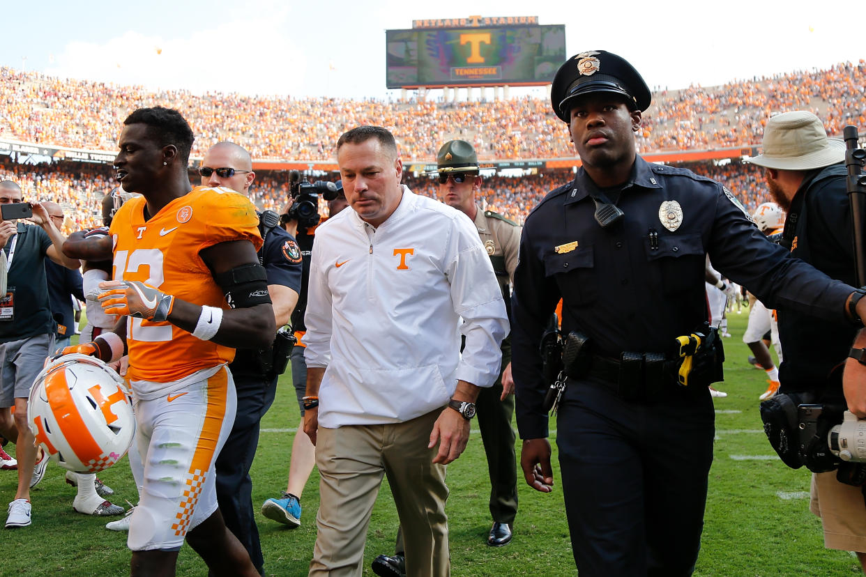Butch Jones’ picture has been on the outside of the Neyland Stadium video board since 2014. (Getty)
