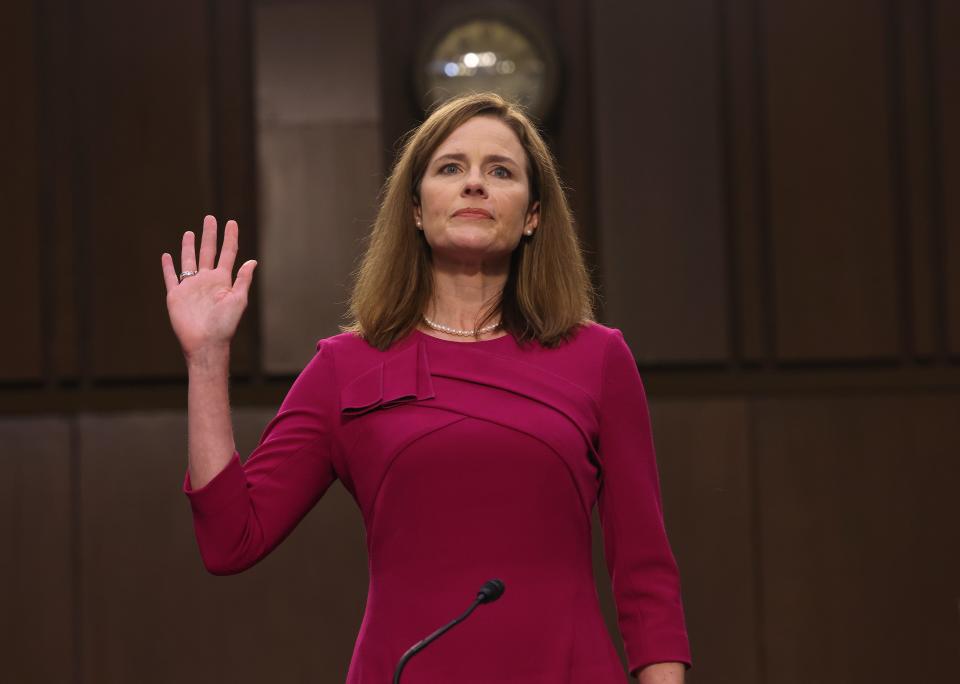 Supreme Court nominee Judge Amy Coney Barrett is sworn into her Senate Judiciary Committee confirmation hearing on Capitol Hill on Monday.