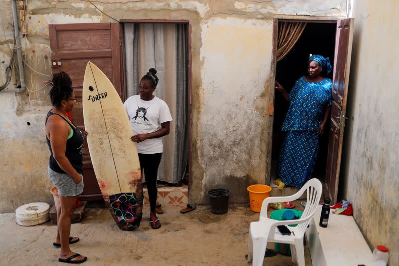 Wider Image: Meet Senegal's first female pro surfer inspiring girls to take to the waves