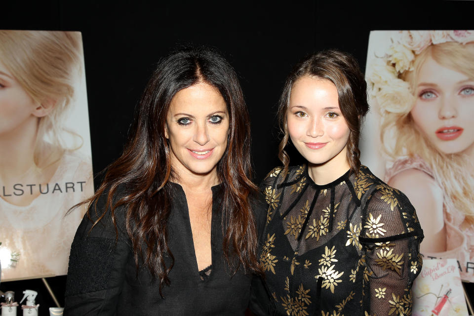 This image released by Starpix shows designer Jill Stuart, left, and actress Katie Chang at the Jill Stuart Spring 2014 show during Fashion Week in New York, Saturday, Sept. 7, 2013. (AP Photo/Starpix, Marion Curtis)