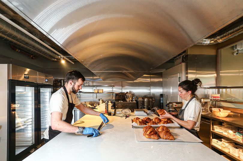 Chefs prepare bread and pastries at Pollen