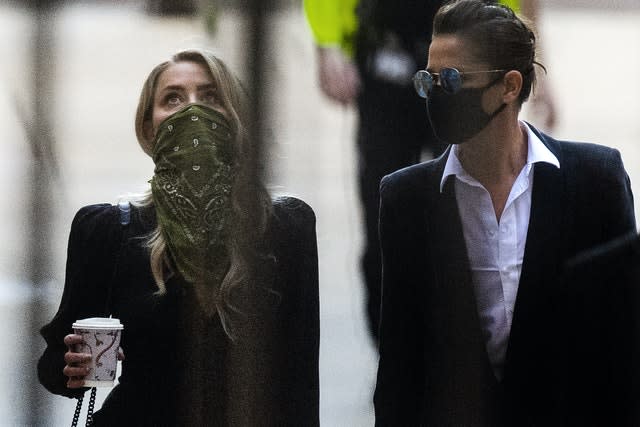 Amber Heard, left, arriving at the High Court