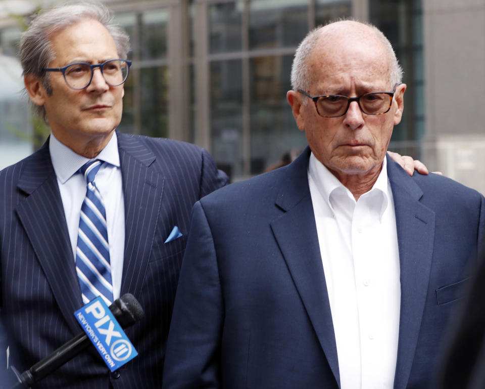 Former Rochester Drug Co-Operative CEO Laurence Doud III, right, leaves US. District Court in Manhattan with his attorney Robert C. Gottlieb, Tuesday, April 23, 2019, in New York. Prosecutors allege Doud ignored red flags to turn his drug distributor into a supplier of last resort as the opioid crisis raged. (AP Photo/Kathy Willens)