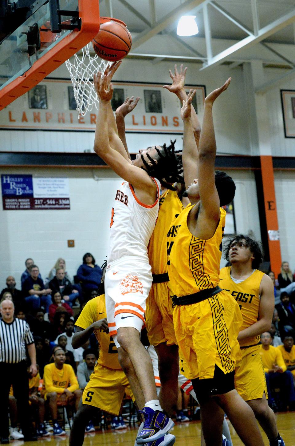 Lanphier's Cameryn Davis goes up for a shot during the game against Southeast High School Tuesday Dec. 6, 2022.