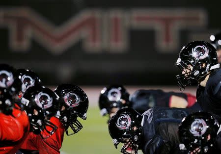 Massachusetts Institute of Technology (MIT) football players attend practice in Cambridge, Massachusetts, November 2014. REUTERS/Brian Snyder