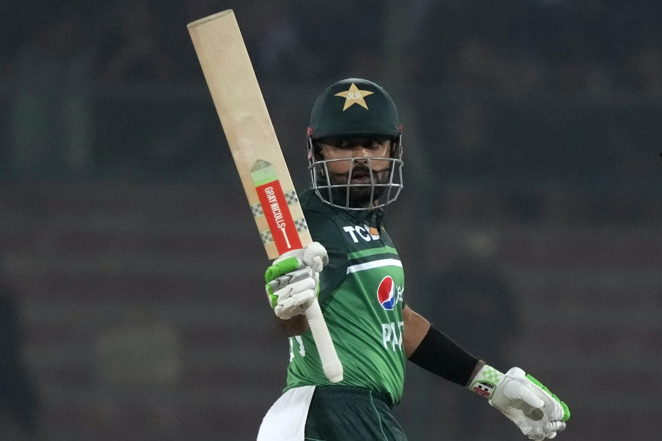 Pakistan's Babar Azam celebrates after scoring 50 runs during the first one-day international cricket match between Pakistan and New Zealand, in Karachi, Pakistan, Monday, Jan. 9, 2023. (AP Photo/Fareed Khan)