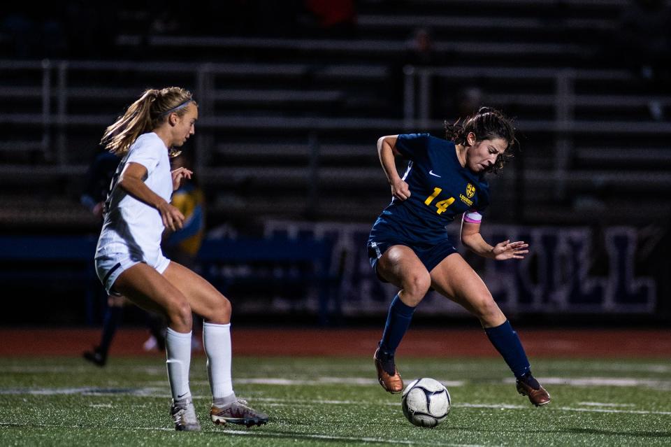 Lourdes' Julia Gigliotti gathers the ball against Rye during the Class A girls soccer regional final on Nov. 4, 2023.