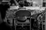 <p>Neighborhood residents attend a free Sunday breakfast and church service at La Requena Belen church in Middletown, Ohio. A young boy picks at cereal.<br> (Photograph by Mary F. Calvert for Yahoo News) </p>