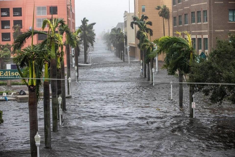 Streets of downtown Fort Myers flooded due to the surge of the Caloosahatchee River as Hurricane Ian hits the west coast of Florida as a Category 4 storm on Wednesday, Sept. 28, 2022.