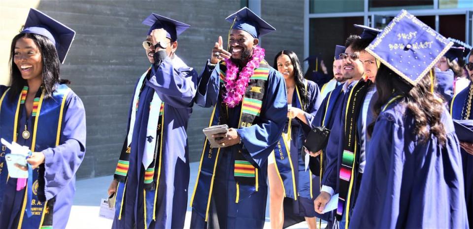 UC Merced graduates make their way to the ceremony before the 2022 UC Merced Graduation Ceremony on Saturday, May 14, 2022 at UC Merced in Merced, Calif. 