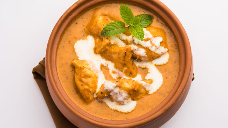 butter chicken curry with cream on top