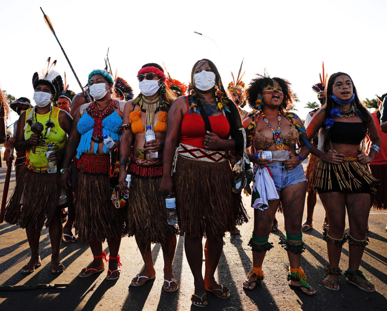 Image: Indigenous Brazilians protest land demarcation and Brazilian President Jair Bolsonaro at the Planalto Palace in Brazil on June 17, 2021. (Sergio Lima / AFP via Getty Images)