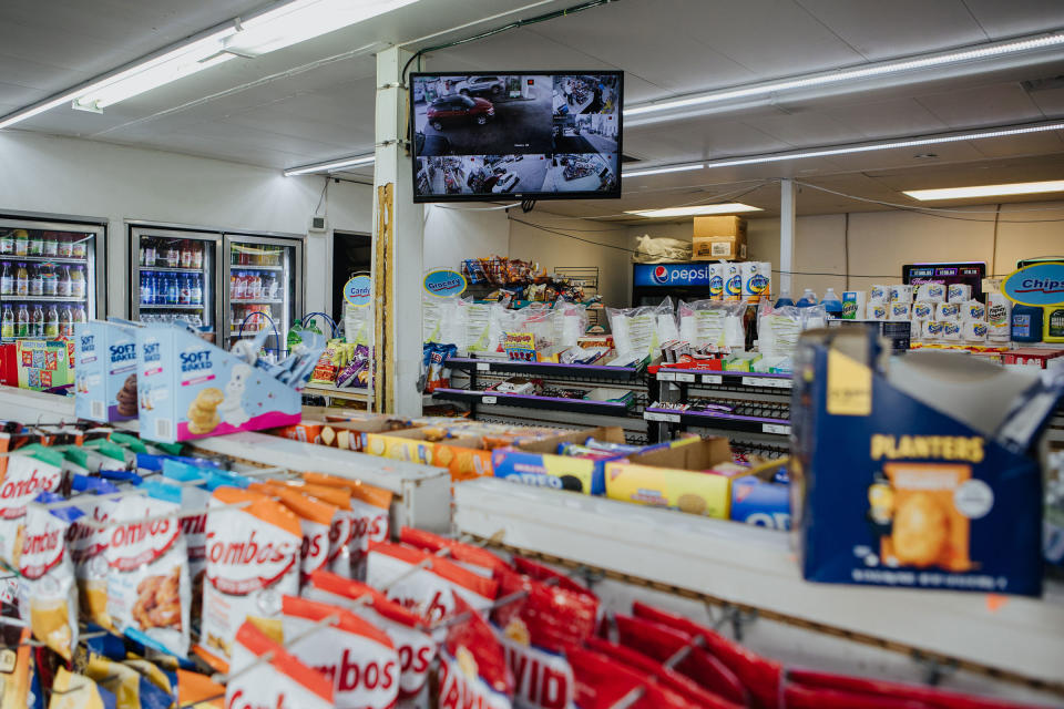 A view into the Karco gas station with a surveillance feed is seen in North Philadelphia, Pa. on April 24, 2023.<span class="copyright">Michelle Gustafson for TIME</span>