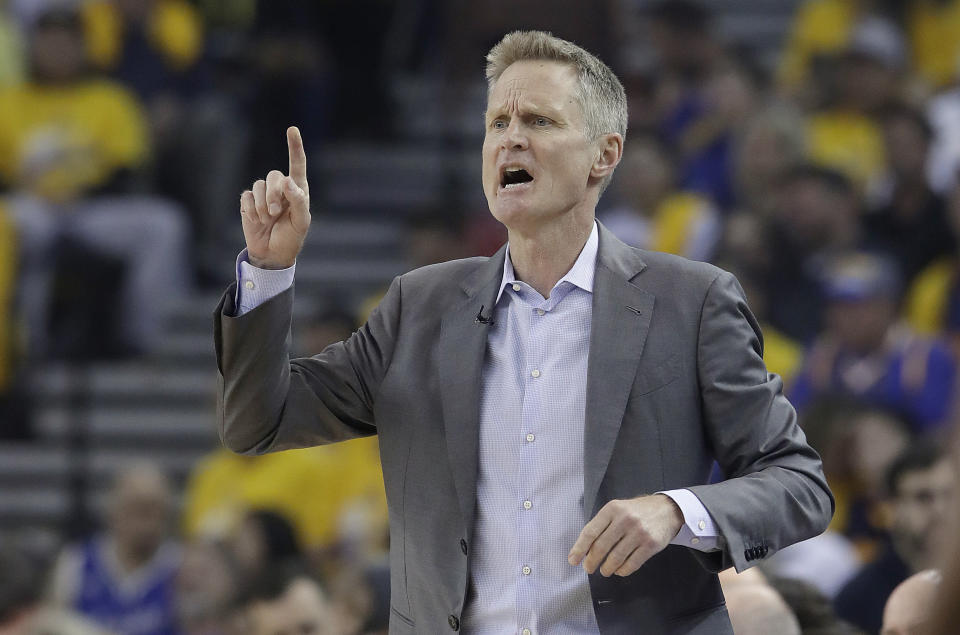 Golden State Warriors head coach Steve Kerr gesturs during the first half of Game 1 of a second-round NBA basketball playoff series against the Houston Rockets in Oakland, Calif., Sunday, April 28, 2019. (AP Photo/Jeff Chiu)