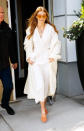 <p>Gigi Hadid steps out in New York City wearing a silk white suit by Zeynep Arçay and the EyeLove mules from Hadid’s new collection with Stuart Weitzman. (Photo: Getty Images) </p>
