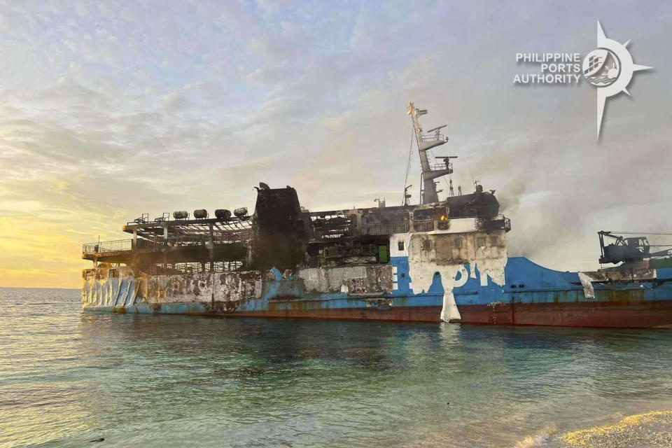 In this handout photo provided by the Philippine Ports Authority Zamboanga, the remains of the MV Lady Mary Joy is seen in Basilan, southern Philippines Thursday March 30, 2023. Several people died while other were reported missing after an inter-island cargo and passenger ferry with about 200 passengers and crew onboard caught fire close to midnight in the southern Philippines, a provincial governor said Thursday. (Philippine Ports Authority Zamboanga via AP)