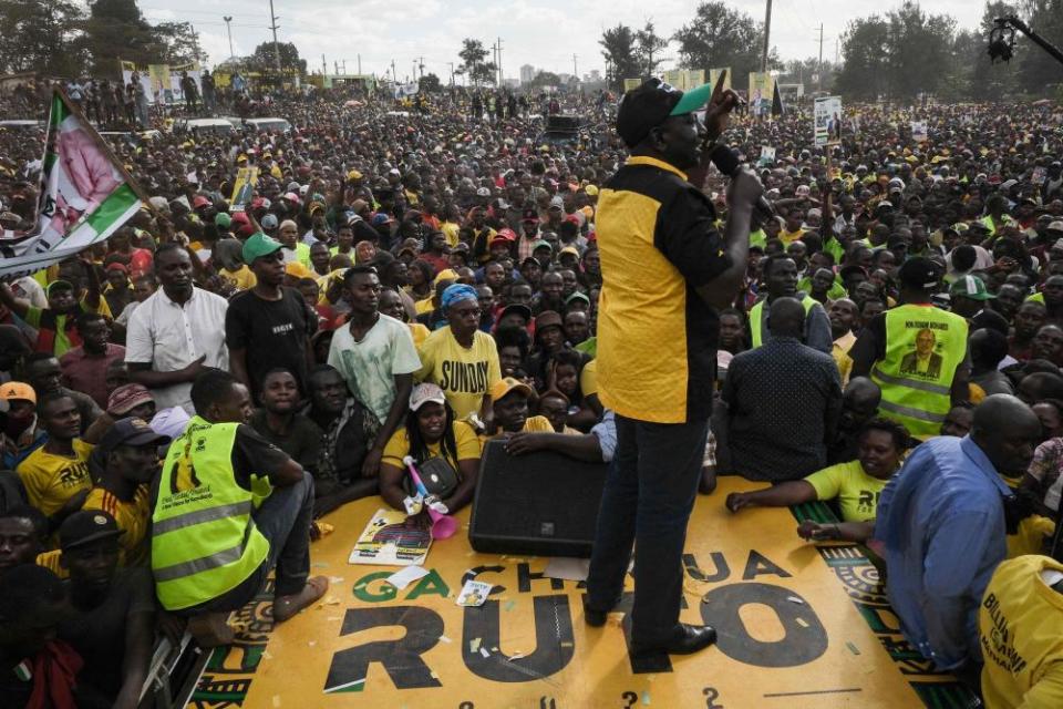 Kenya’s Deputy President William Ruto speaks on a stage