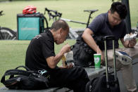 People seen eating at Raffles Place Park on 7 April 2020, the first day of Singapore's month-long circuit breaker period. (PHOTO: Dhany Osman / Yahoo News Singapore)