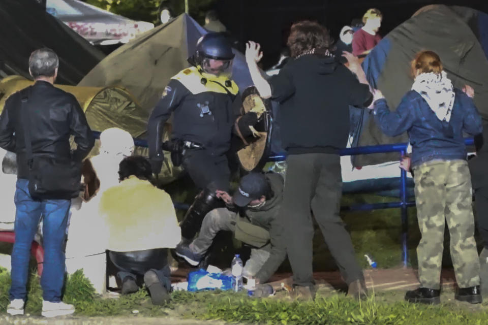 FILE - In this image taken from video Police arrests some 125 activists as they broke up a pro-Palestinian demonstration camp at the University of Amsterdam in Amsterdam, the Netherlands, Tuesday, May 7, 2024, as protests that have roiled campuses in the United States spread into Europe. (AP Photo InterVision, File)