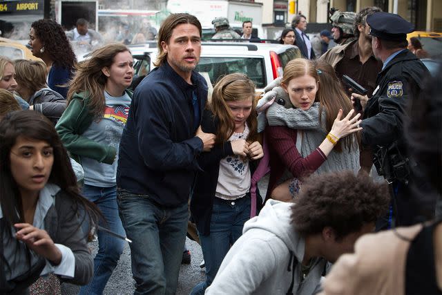 Jaap Buitendijk/Paramount/Everett Brad Pitt, Abigail Hargrove, and Mireille Enos in 'World War Z'