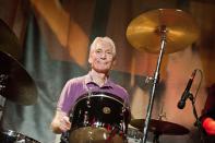 <p>Rock 'n roll has lost one of its most unassuming giants. Charlie Watts, longtime drummer of the Rolling Stones who infused their stadium-size sound with a jazzy swing, has died at the age of 80. A cause of death has not been revealed. Watts manned the drum kit for the legendary act for more than 50 years, building with his beats rock music itself. In an era defined by the flamboyance of his lead man, Mick Jagger, Watts projected a cool and calm; refinement. "I loved playing with Keith and the band—I still do—but I wasn’t interested in being a pop idol sitting there with girls screaming," he famously wrote in his 2003 book, According to the Stones. "It’s not the world I come from. It’s not what I wanted to be, and I still think it’s silly." Watts joined the group in 1963, once the founding members could finally afford the then-established session player. "We starved ourselves to pay for him!" Keith Richards wrote in his own book, Life (2010). "Literally. We went shoplifting to get Charlie Watts." Decades later, as the Stones continue their reign as rock's most influential, and long-lasting outfit, it was worth it. Here, a look back at his seminal career. </p>