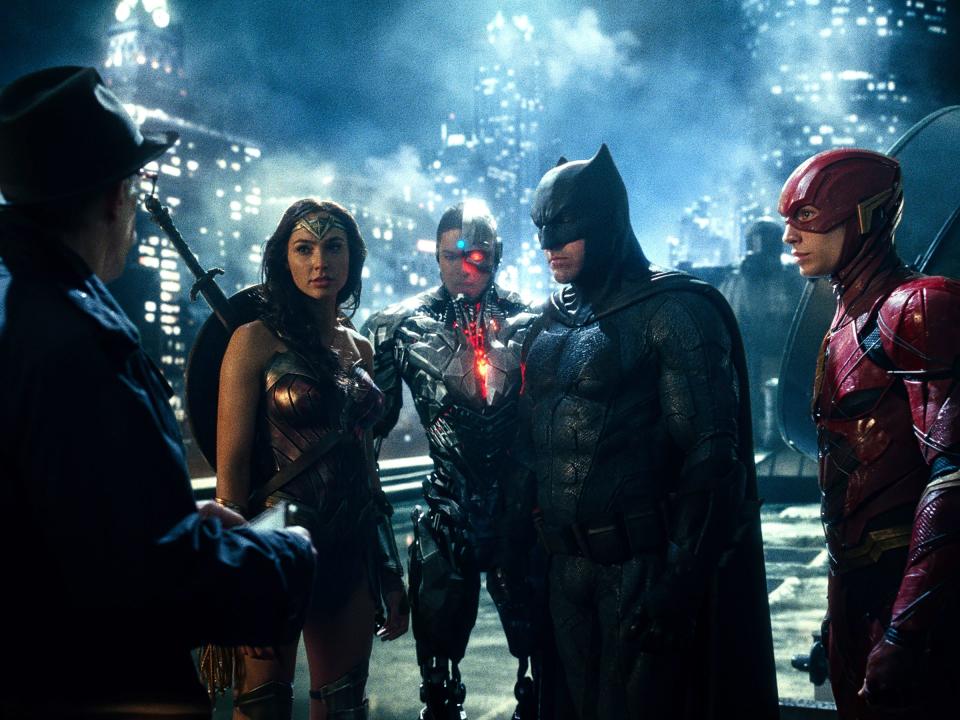 J.K. Simmons as Commissioner Gordon, Gal Gadot as Wonder Woman, Ray Fisher as Cyborg, Ben Affleck as Batman, and Ezra Miller as the Flash in<em> Justice League.</em> (Photo: Warner Bros.)