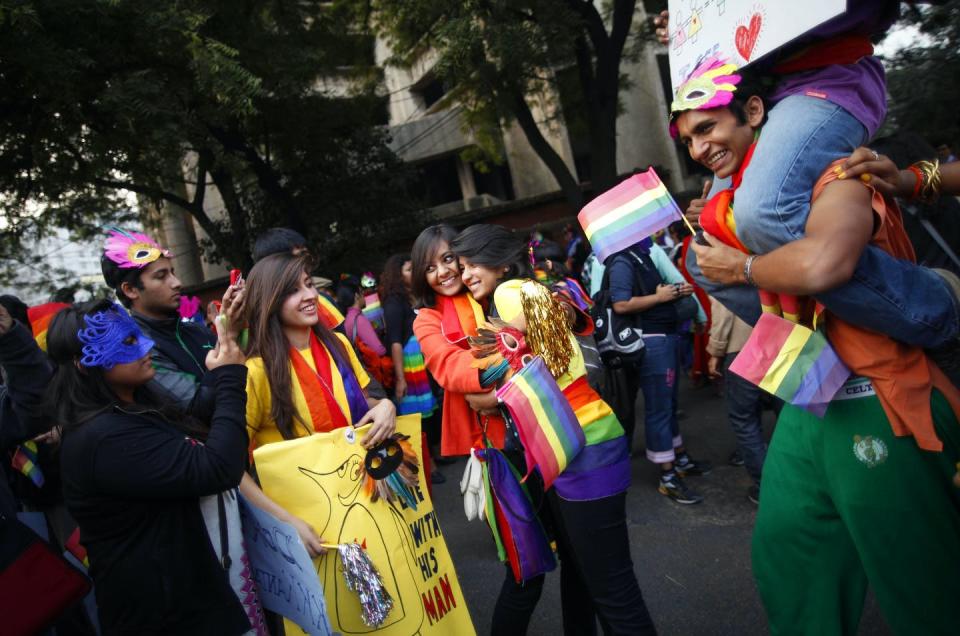 <span class="caption">People from India’s LGBTQ community during a Delhi Queer Pride event in 2011.</span> <span class="attribution"><a class="link " href="https://newsroom.ap.org/detail/IndiaQueerPride/8c5b7a4629e0477a87d5a950a8829fce/photo?Query=india%20transgender%20women&mediaType=photo&sortBy=&dateRange=Anytime&totalCount=19&currentItemNo=5" rel="nofollow noopener" target="_blank" data-ylk="slk:AP Photo/Saurabh Das;elm:context_link;itc:0;sec:content-canvas">AP Photo/Saurabh Das</a></span>