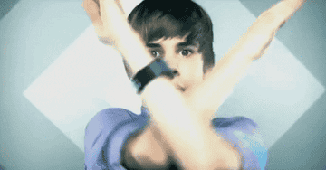 Justin Bieber dancing with his arms