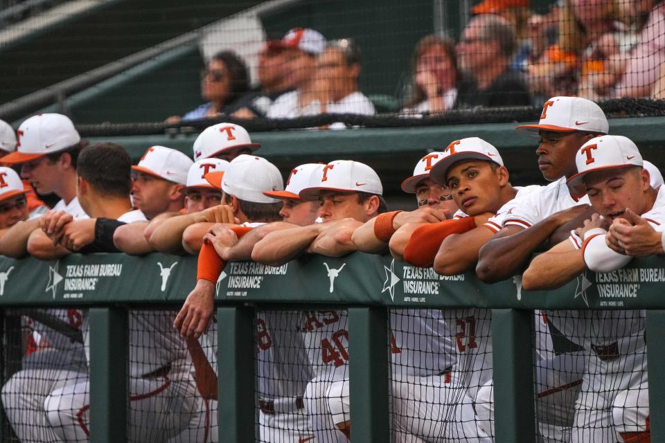 Texas players watch from the dugout during the May 3 game against Oklahoma at UFCU Disch-Falk Field. The 25th-ranked Longhorns close out the regular season at home this week against Kansas.