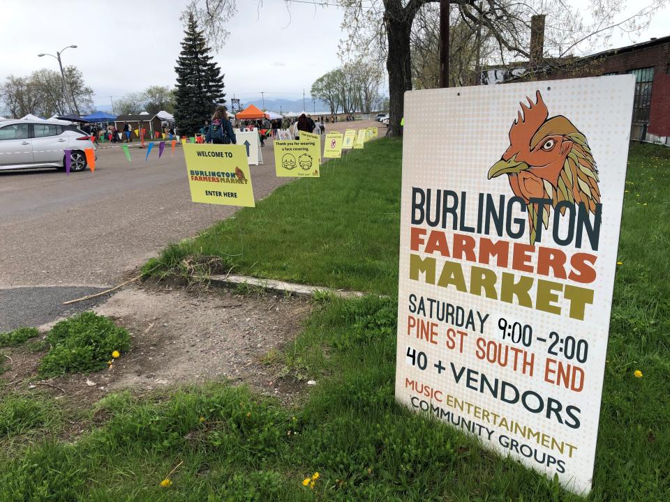 A sign marks the entrance to the Burlington Farmers Market on Pine Street in Burlington on the market's opening day for the year, Saturday, May 8, 2021.