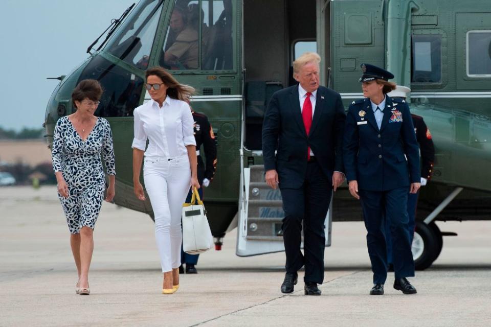 On 27 July, Melania Trump dressed in head-to-toe white opting for a pair of straight cut jeans and a shirt with rolled up sleeves. For a pop of colour, the First Lady accessorised the look with a pair of her go-to Manolo Blahnik BB pump in punchy yellow with a co-ordinating handbag in tow. [Photo: Getty]