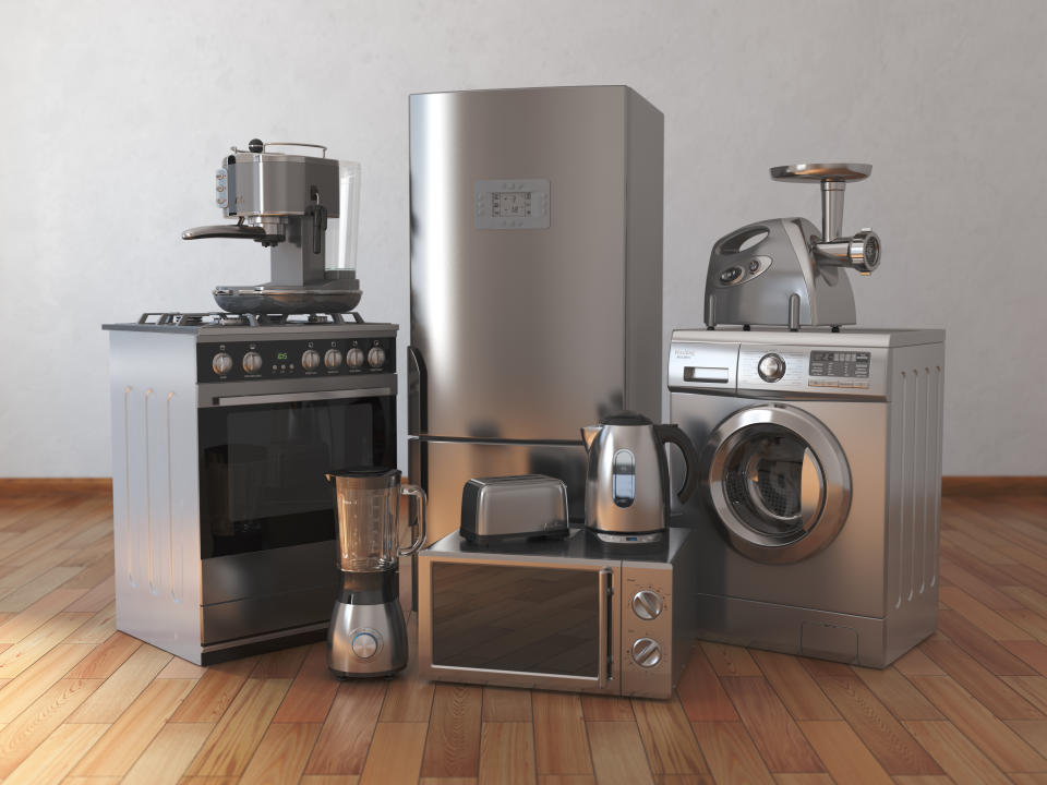 Home appliances. Household kitchen technics in the empty room. 3d illustration