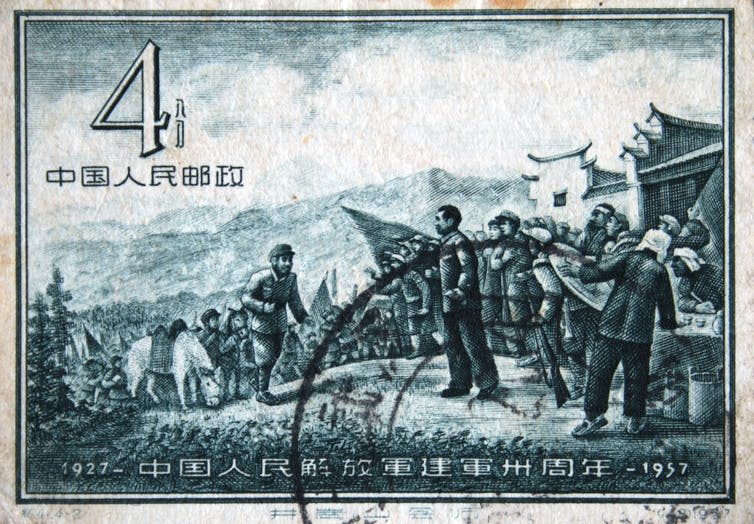 Stamp from 1957 showing Mao meeting peasants.